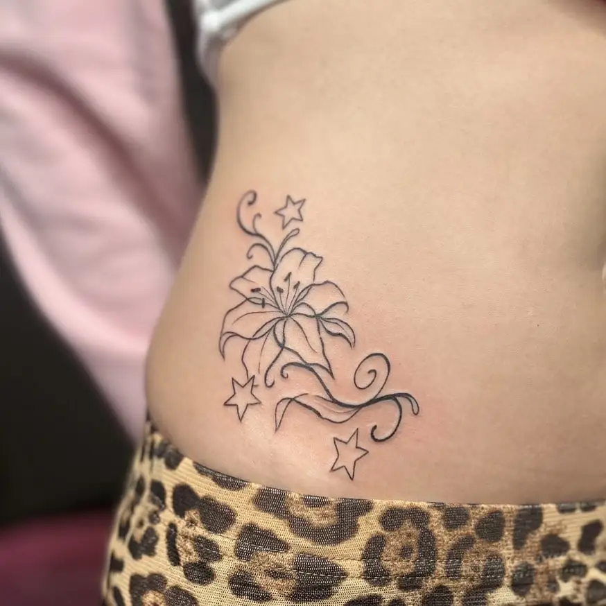 Fine line lily with stars on a hip