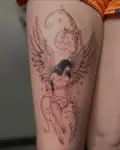 Fine line angel with wings and ornamental swirls on a thigh