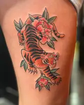 Traditional tiger tattoo with pink peonies in full color
