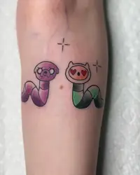 Two cartoon worms dressed as Finn and Jake from Adventure Time