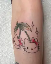 Hello Kitty faces as a pair of cherries in red and black